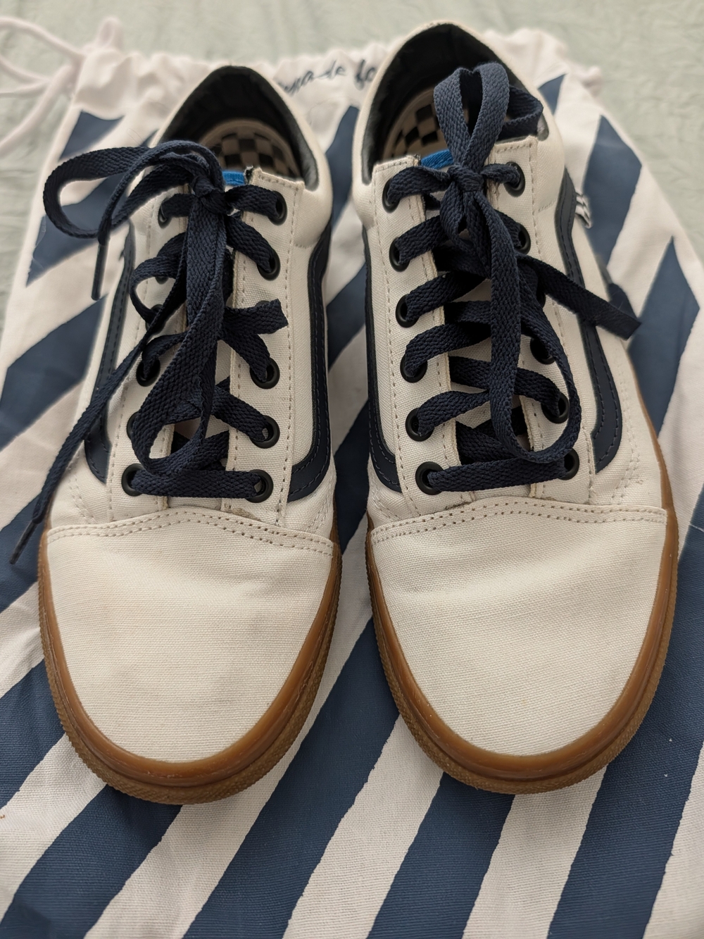 Vans White Canvas Low-Top Sneakers with Navy Trim and Gum Sole